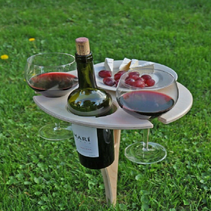 Foldable picnic table with wine holder