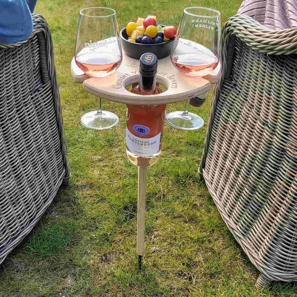 Foldable picnic table with wine holder