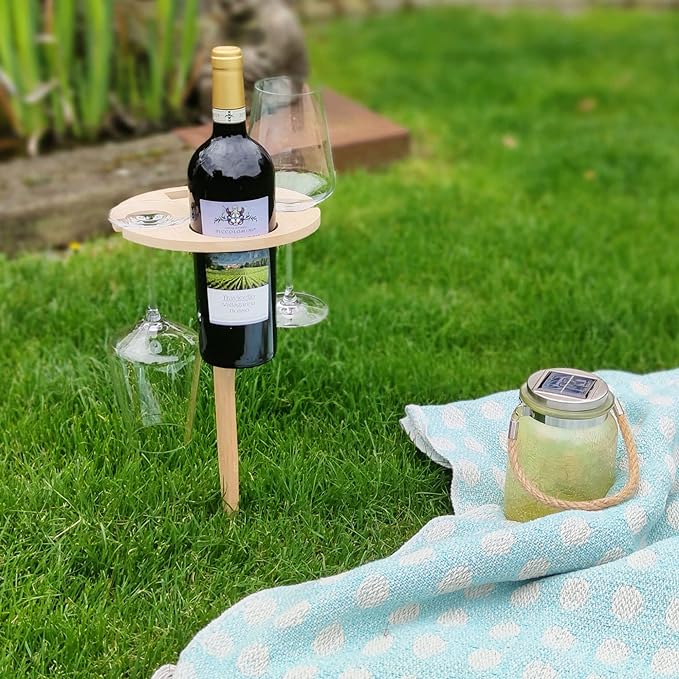 Foldable picnic table with wine holder